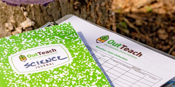 Out Teach notebooks outdoors