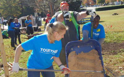 Volunteers helping build garden