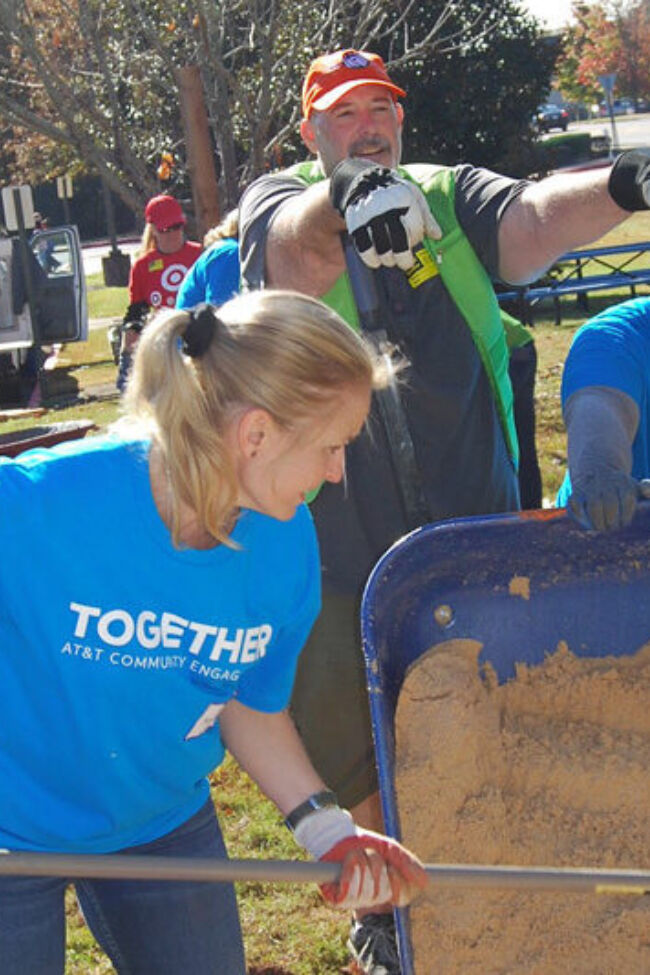 Volunteers helping build garden