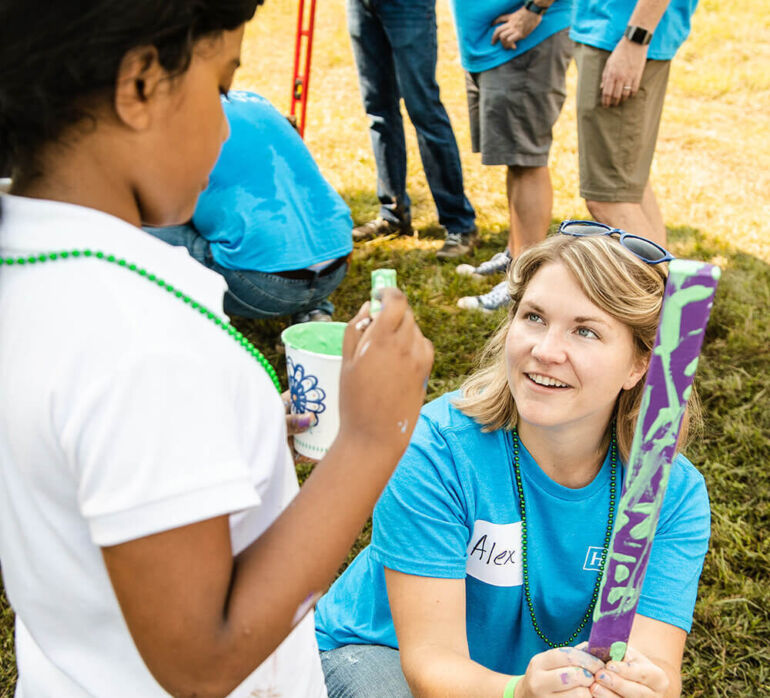 Hilton corporate partner helping student - cropped