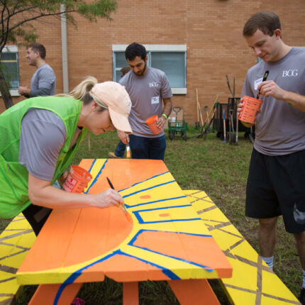 BOG Event - Volunteers painting picnic table