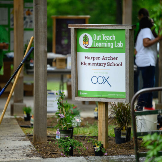 COX Event -  Harper-Archer Elementary sign in garden