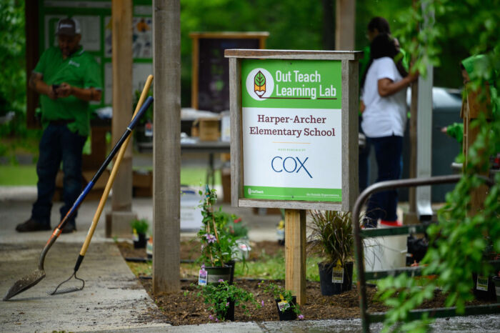 COX Event -  Harper-Archer Elementary sign in garden