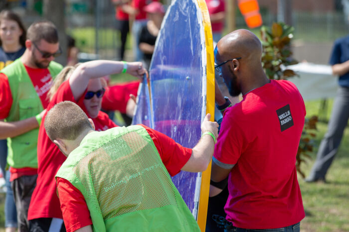 Well Fargo Event - Volunteers moving outdoor lab